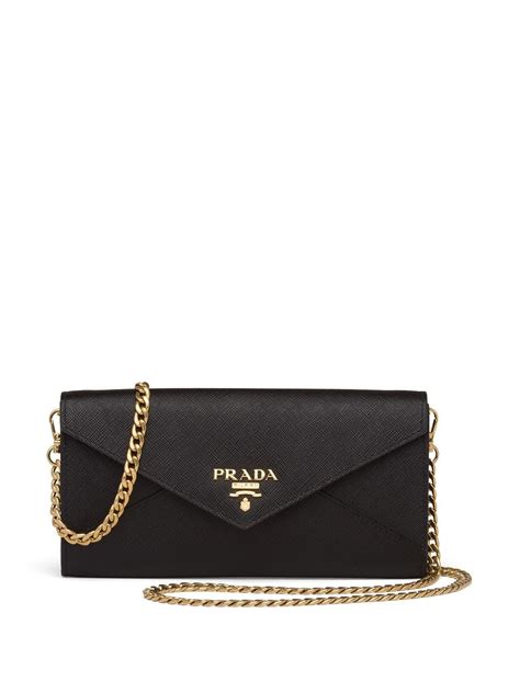 prada gold logo clutch|Prada clutch for women.